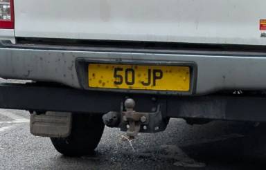 UK Number Plate 50 JP on a 2022 Blue Toyota Hilux