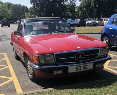 UK Number Plate 50 SE on a 1989 RED Mercedes SL