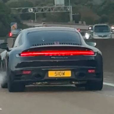 UK Number Plate 51 OW on a 2019 Black Porsche 911