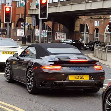 UK Number Plate 52 SD on a 2014 Black Porsche 911