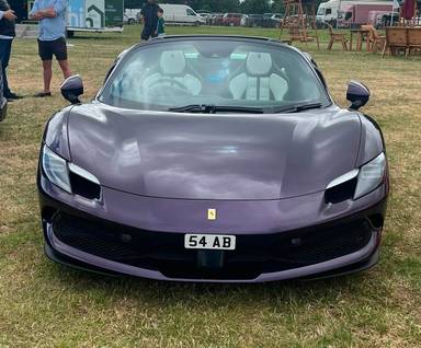 UK Number Plate 54 AB on a 2024 Purple Ferrari 296 Gts S-A