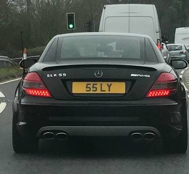 UK Number Plate 55 LY on a 2005 Black Mercedes SLK