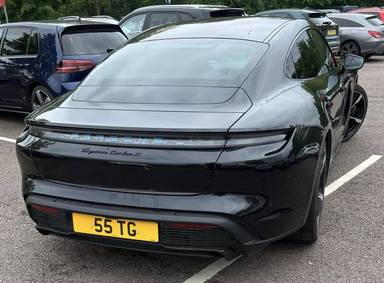 UK Number Plate 55 TG on a 2023 Black Porsche Taycan Turbo S