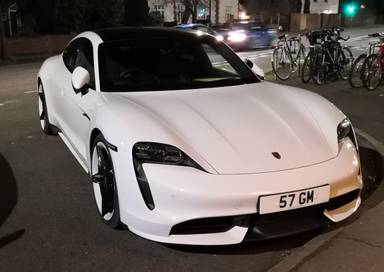 UK Number Plate 57 GM on a 2021 White Porsche Taycan Turbo