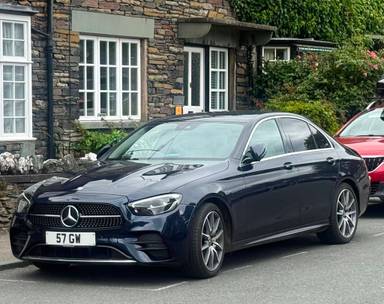 UK Number Plate 57 GW on a 2021 Blue Mercedes-Benz E 300 Amg Line Edition Mhev A