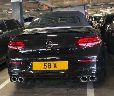 UK Number Plate 58 X on a 2019 Black Mercedes-Benz C