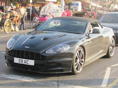 UK Number Plate 59 AC on a 2012 Black Aston Martin DBS