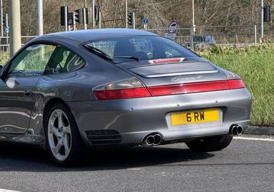 UK Number Plate 6 RW on a 2004 Black Porsche 911