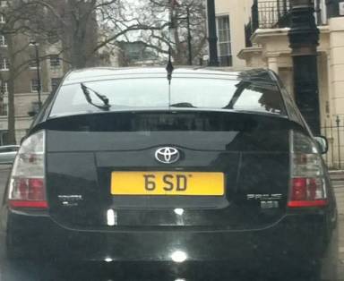 UK Number Plate 6 SD on a 2006 Black Toyota Prius