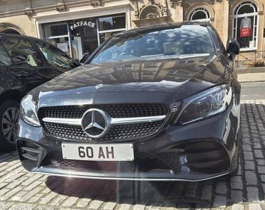 UK Number Plate 60 AH on a 2020 Black Mercedes-Benz C
