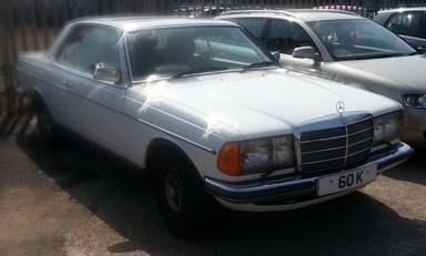 UK Number Plate 60 K on a 1982 White Mercedes C