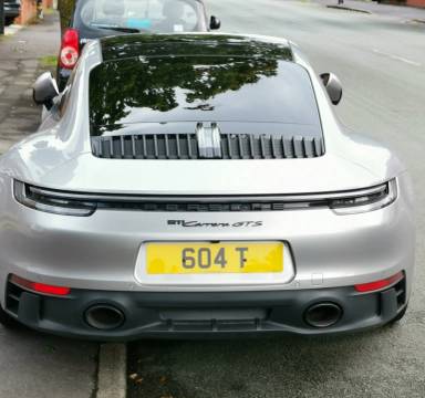 UK Number Plate 604 T on a 2023 Silver Porsche 911 Carrera Gts S-A