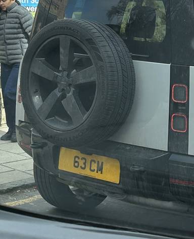 UK Number Plate 63 CM on a 2025 Grey Land Rover Defender Xdynamic Hse D Mhev A