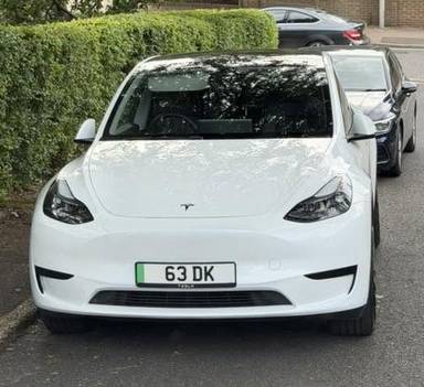 UK Number Plate 63 DK on a 2023 White Tesla Model Y Rwd