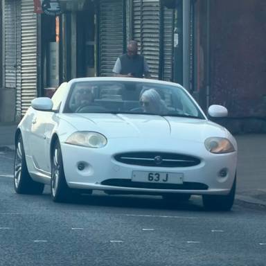 UK Number Plate 63 J on a 2006 Silver Jaguar XK