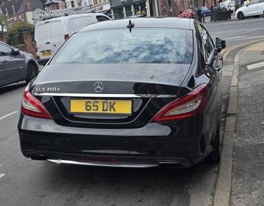 UK Number Plate 65 DK on a 2017 Black Mercedes-Benz CLS
