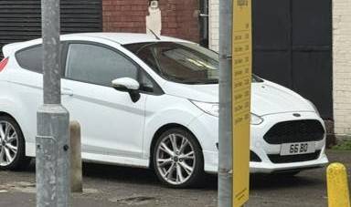 UK Number Plate 66 BO on a 2013 White Ford Fiesta