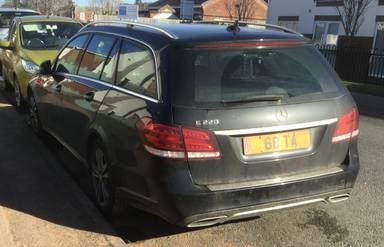 UK Number Plate 68 TA on a 2015 Black Mercedes-Benz E