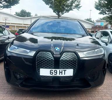 UK Number Plate 69 HT on a 2022 Black BMW Ix Xdrive40 M Sport