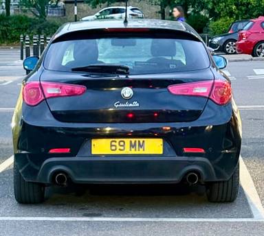 UK Number Plate 69 MM on a 2011 Black Alfa Romeo Giulietta