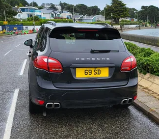 UK Number Plate 69 SD on a 2013 Black Porsche Cayenne