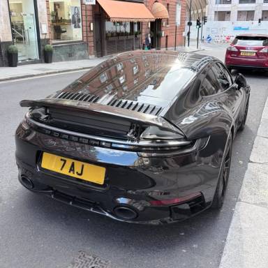 UK Number Plate 7 AJ on a 2023 Black Porsche 911 Carrera 4 Gts S-A