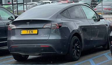 UK Number Plate 7 EN on a 2022 Grey Tesla Model Y Long Range Awd