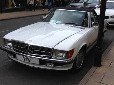 UK Number Plate 7 FE on a 1988 White Mercedes SL