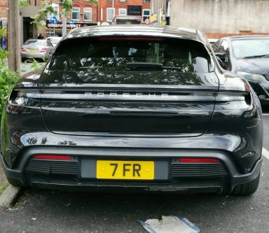 UK Number Plate 7 FR on a 2022 Black Porsche Taycan 4 Cross Turismo