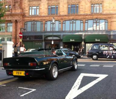 UK Number Plate 7 OV on a 1988 Green Aston Martin V8 Volante
