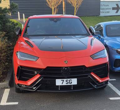 UK Number Plate 7 SG on a 2024 Orange Lamborghini Urus V8 Performante Auto
