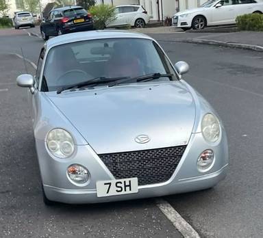 UK Number Plate 7 SH on a 2004 Silver Daihatsu