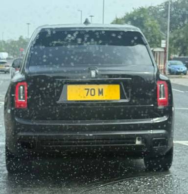 UK Number Plate 70 M on a 2022 Black Rolls Royce Cullinan Black Badge Auto