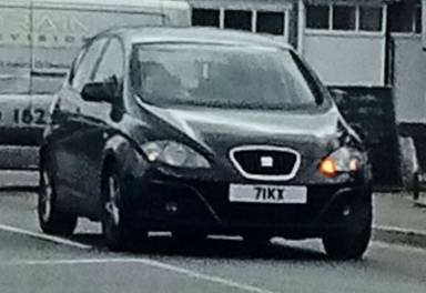 UK Number Plate 71 KX on a 2012 Black Seat Altea