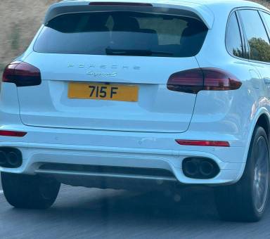 UK Number Plate 715 F on a 2015 White Porsche Cayenne