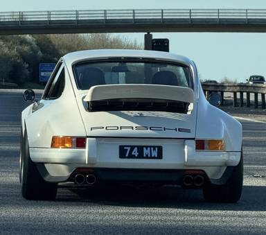 UK Number Plate 74 MW on a 1990 Blue Porsche 911