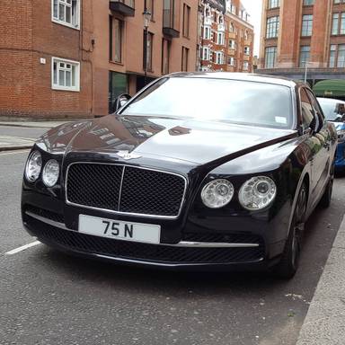 UK Number Plate 75 N on a 2013 Black Bentley Flying Spur