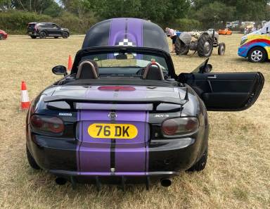 UK Number Plate 76 DK on a 2006 Black Mazda Mx-5