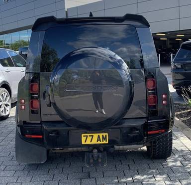 UK Number Plate 77 AM on a 2023 Grey Land Rover Defender Hdtp Xdyn Hse Dmhev A