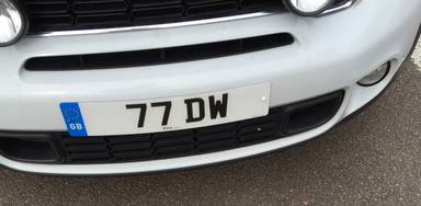 UK Number Plate 77 DW on a 2015 White Mini Countryman