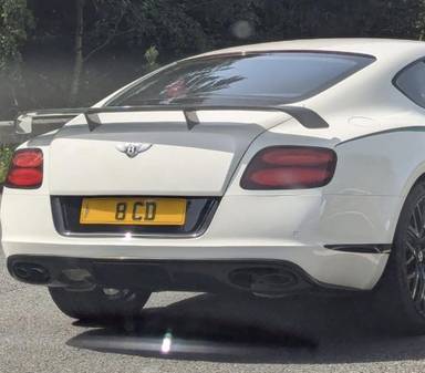 UK Number Plate 8 CD on a 2015 White Bentley Continental