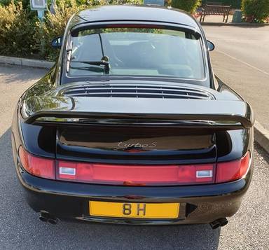 UK Number Plate 8 H on a 1998 Black Porsche 911