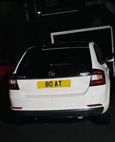 UK Number Plate 80 AT on a 2016 White Skoda Rapid