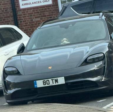 UK Number Plate 80 TM on a 2023 Grey Porsche Taycan 4s Sport Turismo