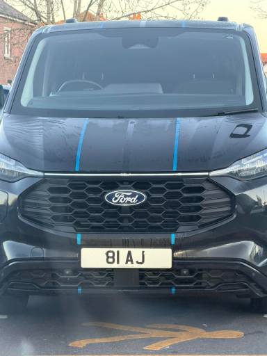 UK Number Plate 81 AJ on a 2025 Black Ford Transit Custom 320 Sprt Phev A