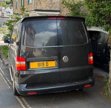UK Number Plate 819 D on a 2009 Black Volkswagen Transporter