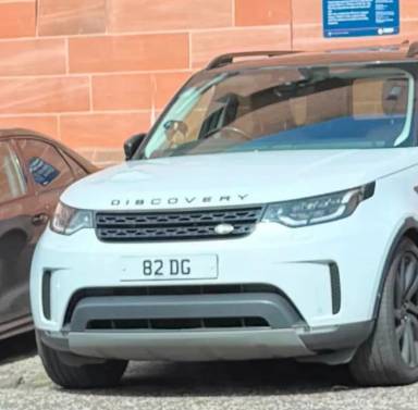 UK Number Plate 82 DG on a 2019 White Land Rover Discovery