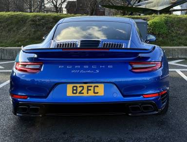 UK Number Plate 82 FC on a Blue Porsche