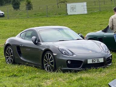 UK Number Plate 82 SL on a 2013 Grey Porsche Cayman