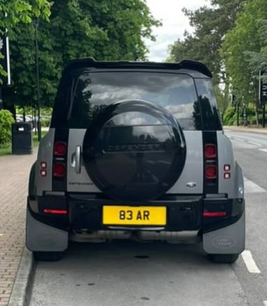 UK Number Plate 83 AR on a 2025 Black Land Rover Defender X-Dynamic Se D Mhev A
